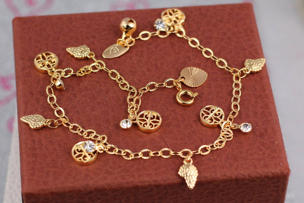 

Браслет Xuping Jewelry на ногу с множеством кулонов 26 см золотистый