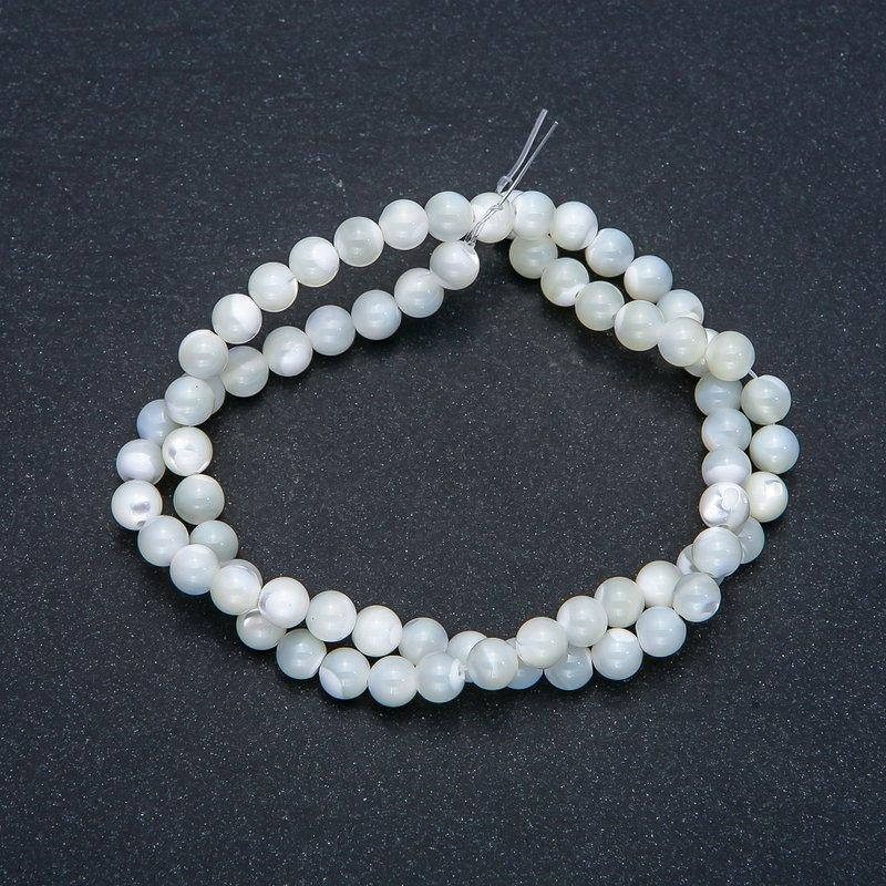 

Бусины из камня Перламутр Баламут на нитке гладкий шарик d-6мм L -38см