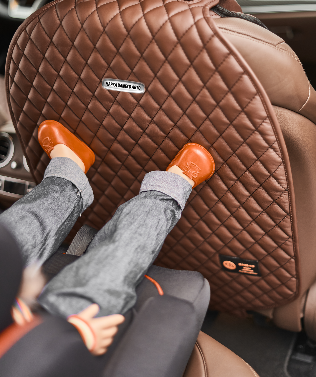 

Защитная накидка на спинку сидения от детских ног от Carbag