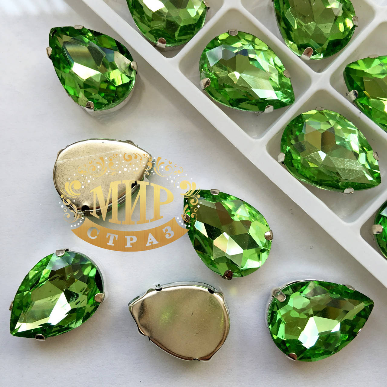 

Cтразы в цапах, Капля, Размер 18x25, Цвет Peridot