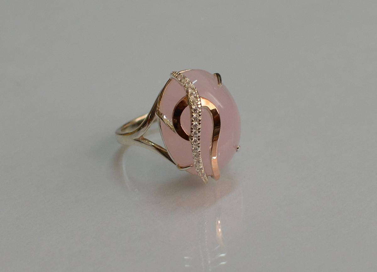 

Кольцо из серебра с золотыми вставками 150к 20.5