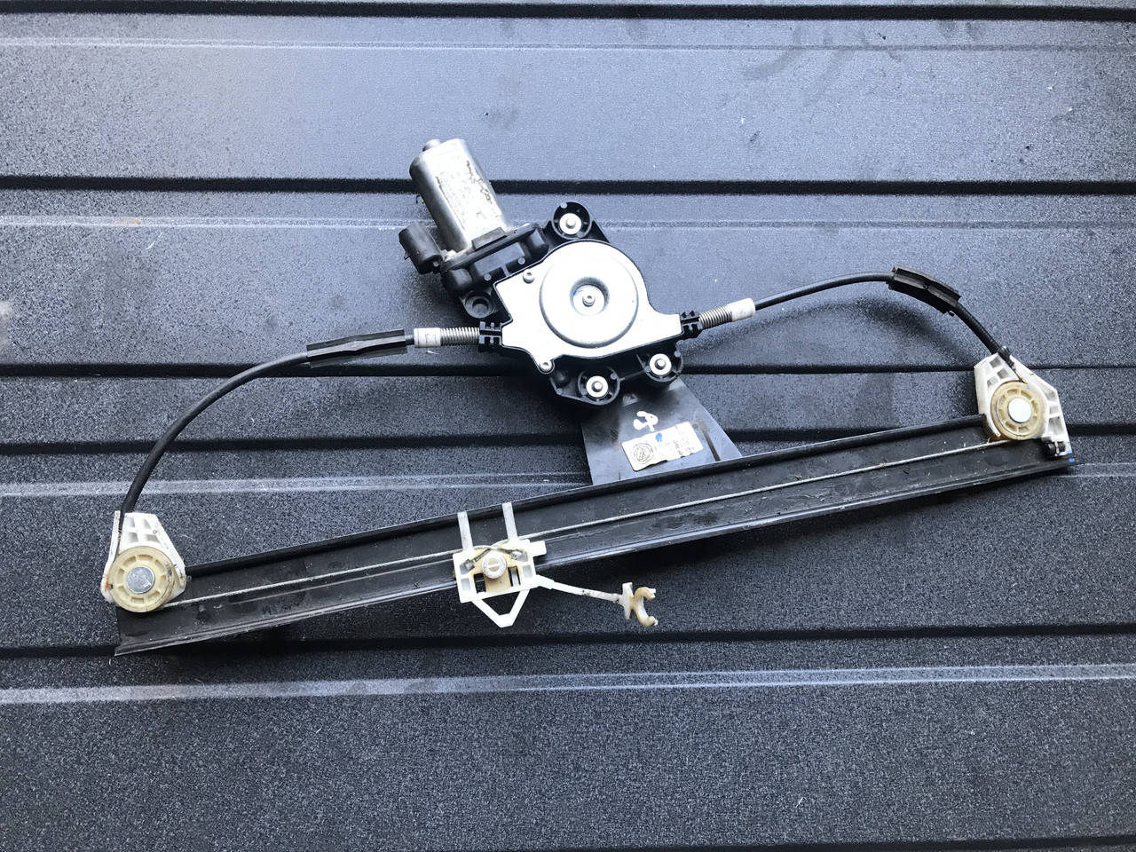 

Стеклоподъемник передний левый электр Fiat Doblo 2000-2005 0517931890E