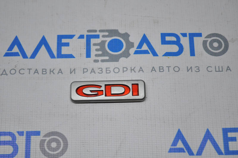 

Эмблема EX GDI крышки багажника Kia Optima 11-15 86311-2T000 Киа Оптима 2011-2015