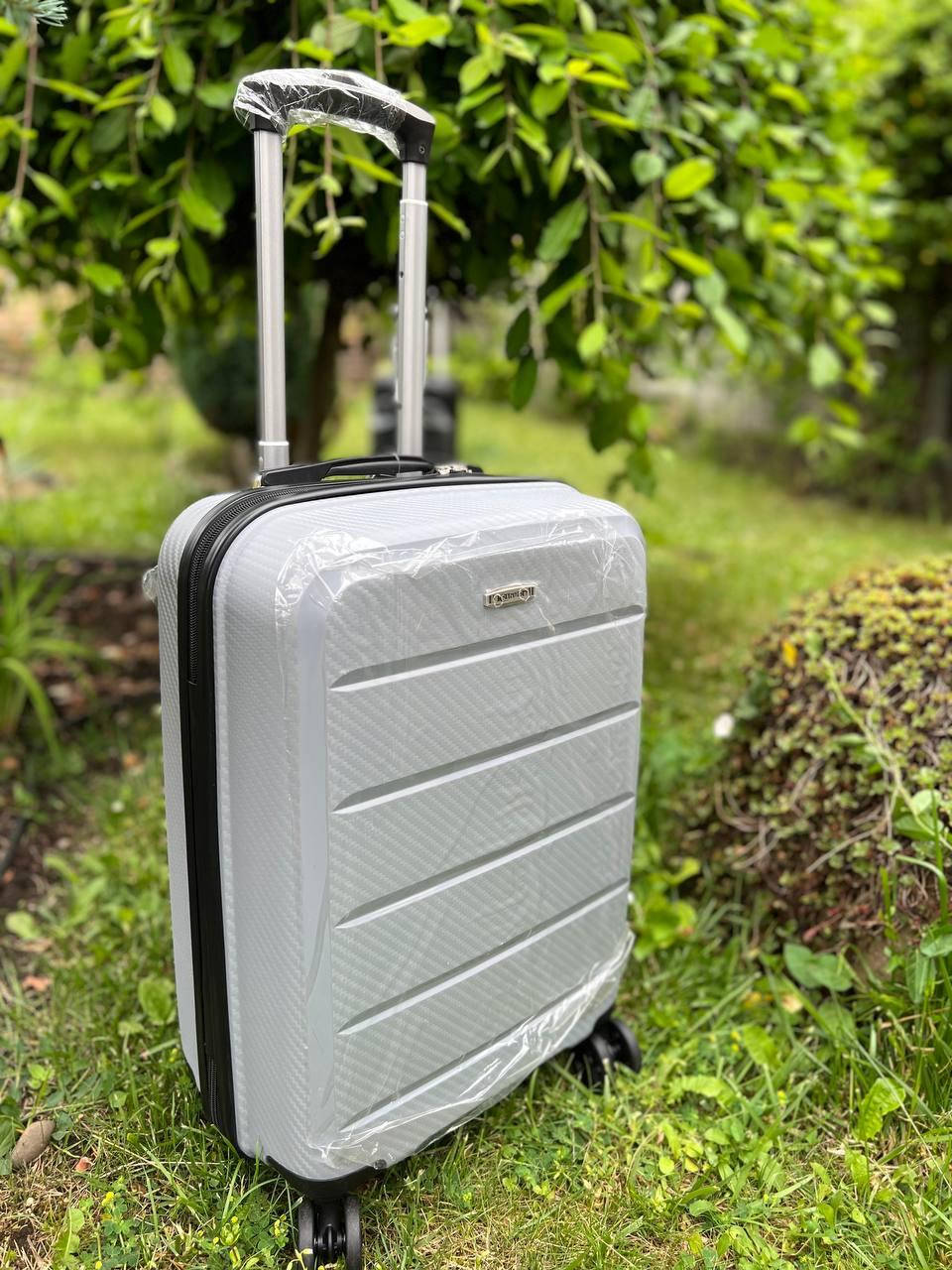 

Чемодан дорожный  ручная кладь из полипропилена серый 55х40х21