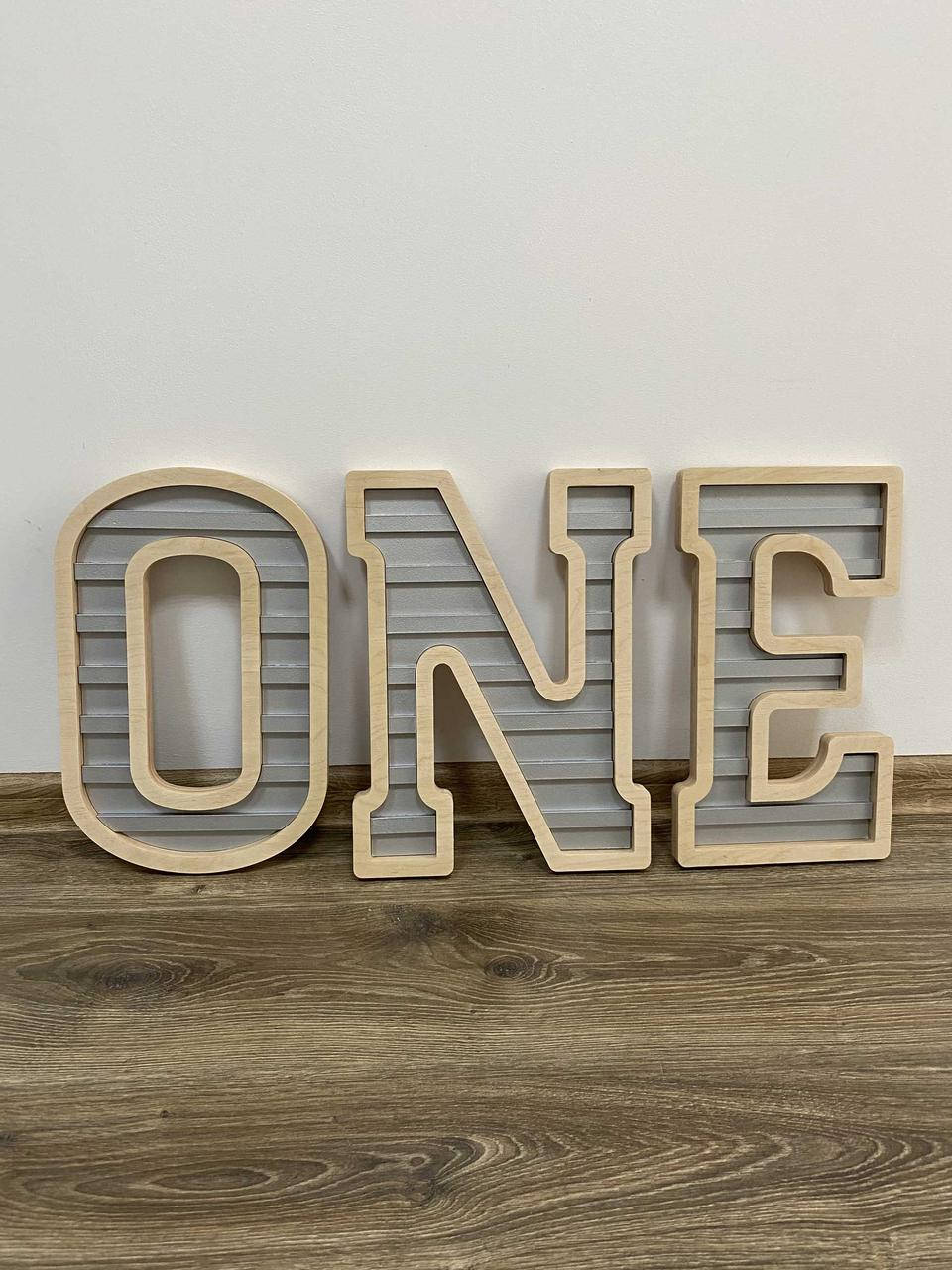 

Надпись объемная ONE Manific Decor из дерева с покраской для фотозоны Светлое дерево + Серый