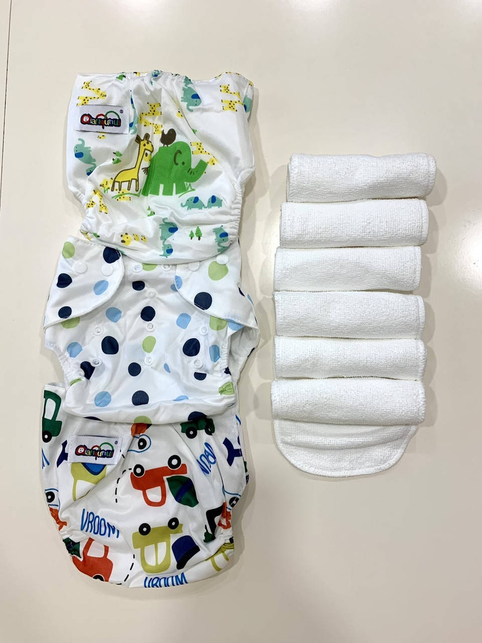 

Набор цветных многоразовых подгузников (3 подгузника + 6 вкладышей) для мальчика