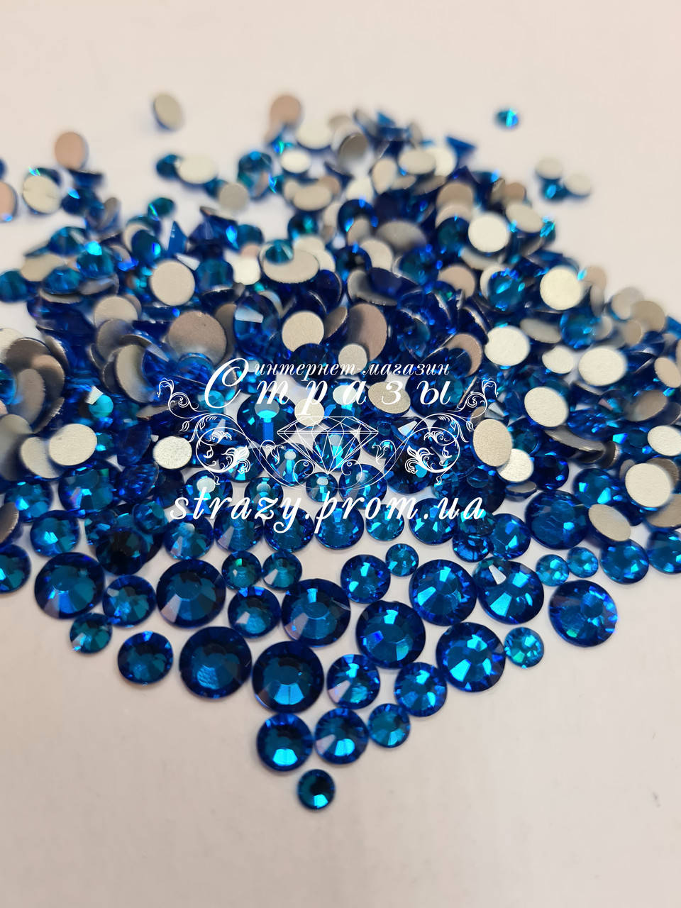 

Стразы Capri Blue Микс размеров 1400шт (ss12,ss16,ss20,ss30) "Crystal Premium"