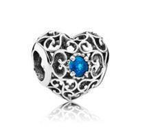 

Серебряный шарм Pandora "Сапфировое ажурное сердце" 791784SSA
