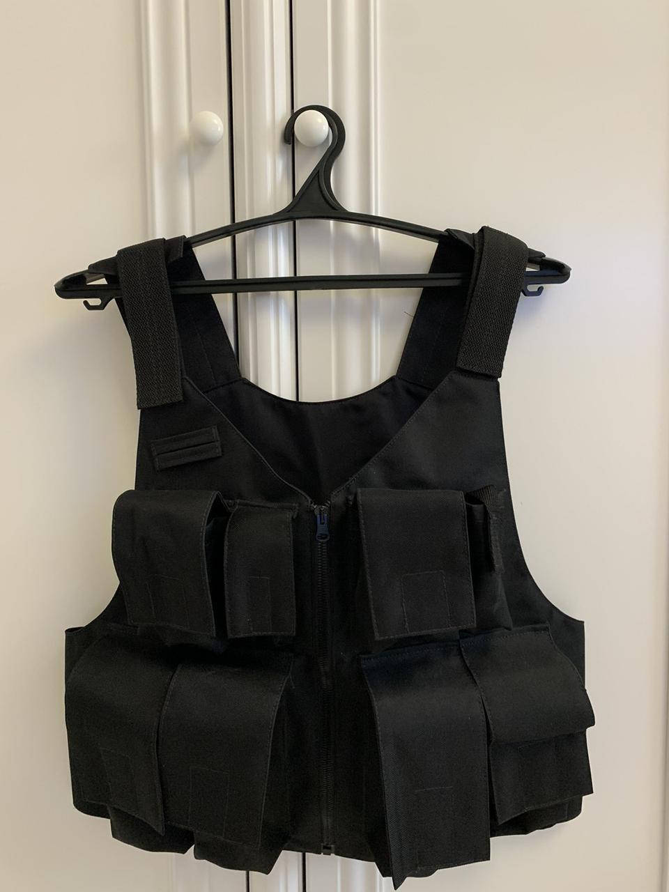 

Разгрузочный жилет из ткани Оксфорд 600d + полиуретановое покрытие + 8 подсумков (Черный)