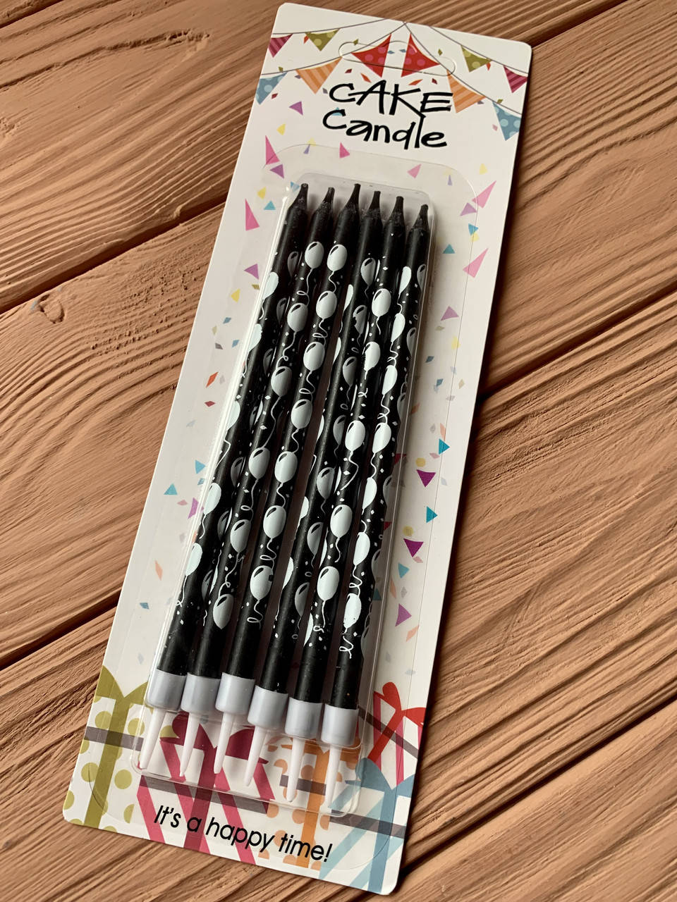 

Свечи для торта чёрные с белыми шариками (6 штук)