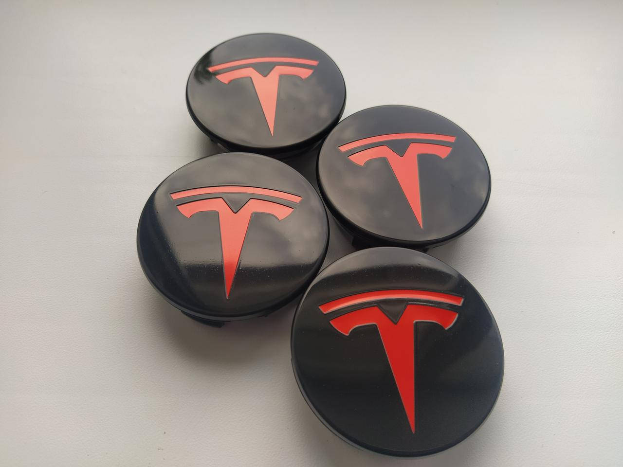 

Колпачки заглушки на диски Tesla 57/50/12 мм. Черные/Красный