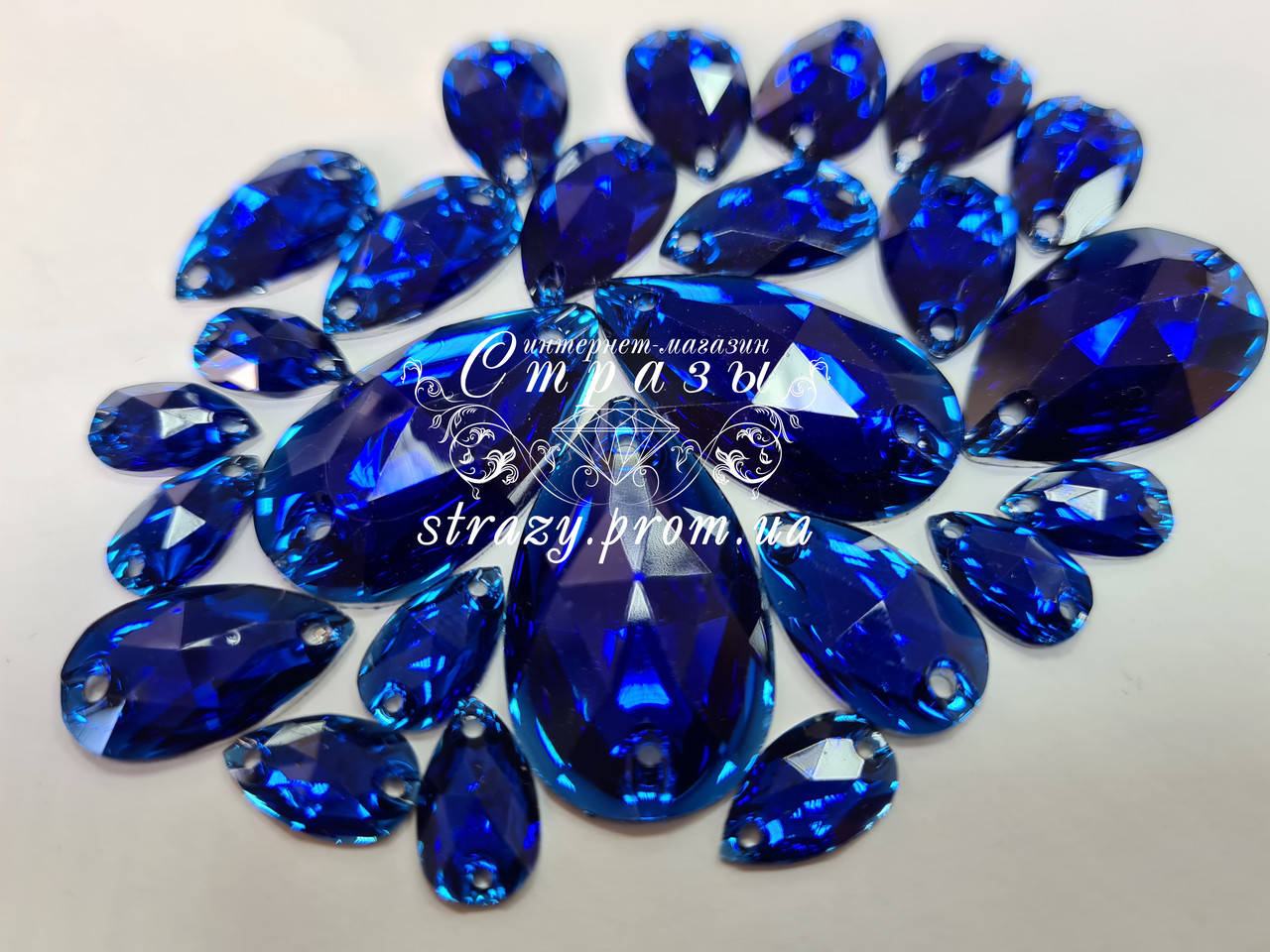 

Стразы пришивные Капля 7х12мм. Акрил Sapphire