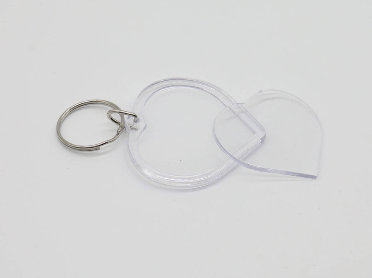 

Акриловые заготовки для брелка. Сердце. 50х50мм (Фото 41х38мм).