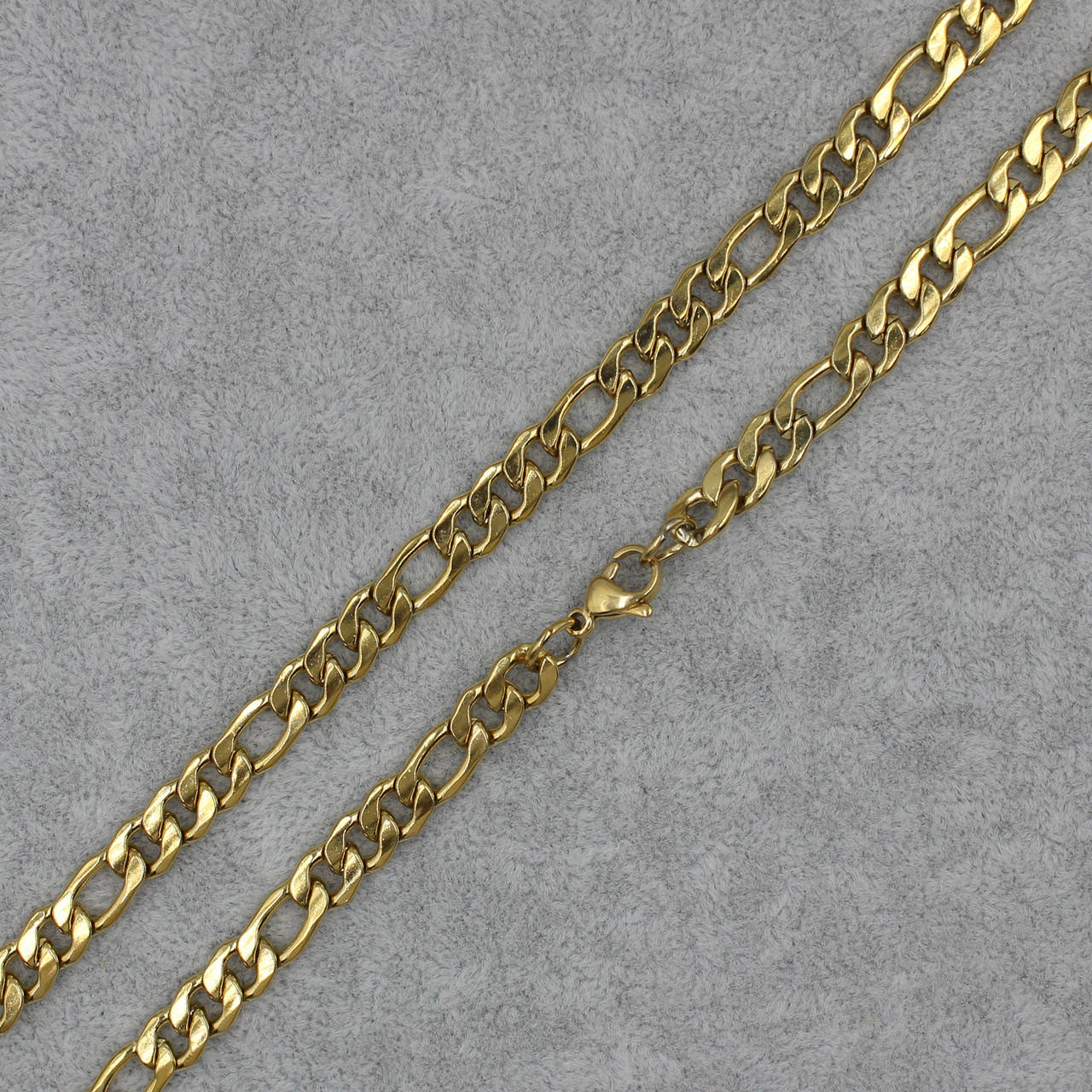 

Мужская цепочка Картье нержавеющая медицинская сталь Stainless Steel длина 60 см. ширина 7 мм цвет золото