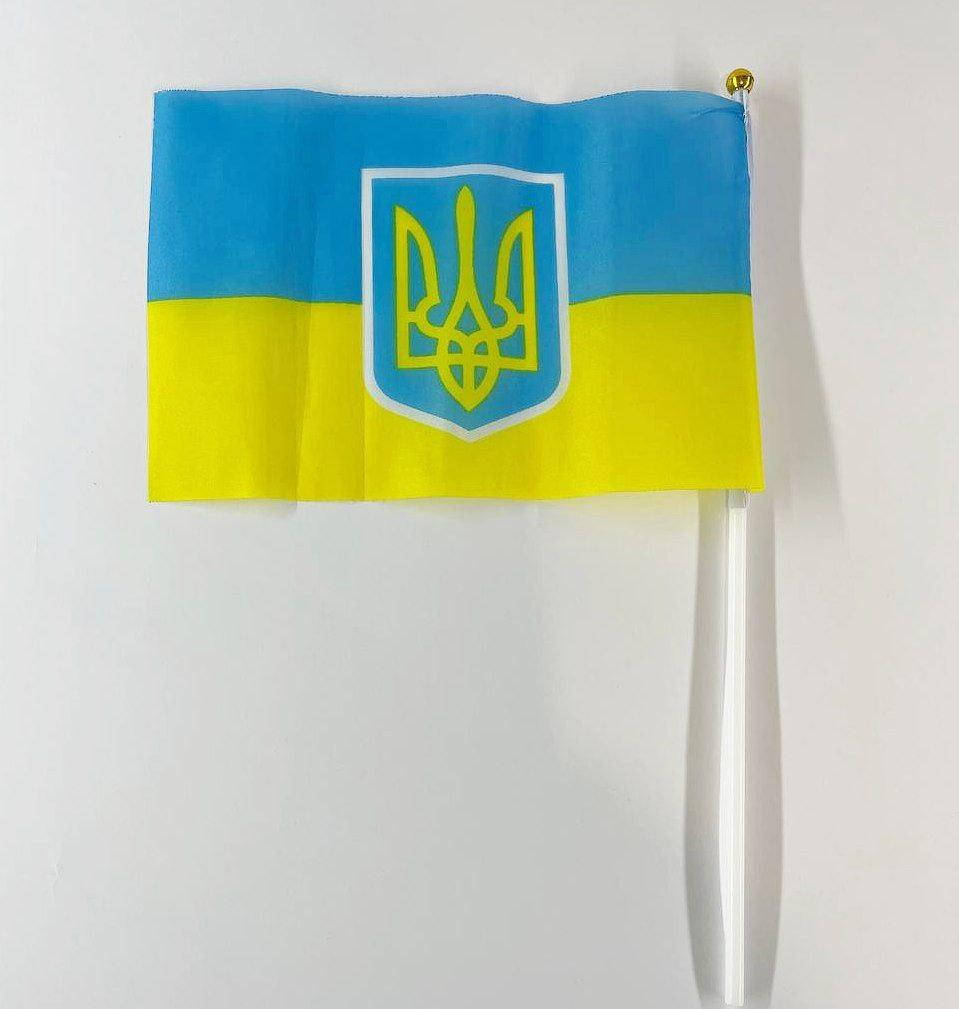 

Флажок Украины сувенирный, флаг Украины с гербом на ручке 14см х 21см