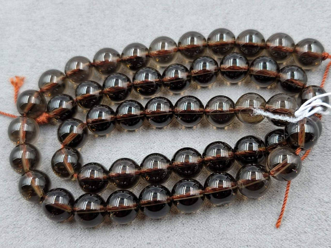 

Бусины Раухтопаз на нитке гладкий шарик d-8мм(+-) L-37см(+-)