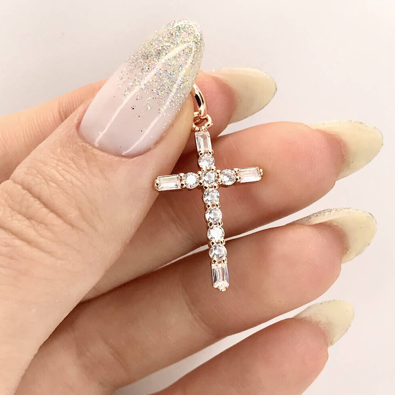 

Крестик с белыми кристаллами позолота 18к.