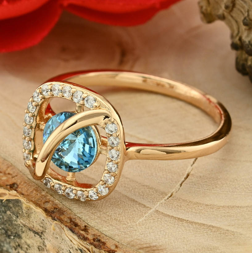 

Кольцо Xuping с кристаллами Swarovski 83221 ширина 11 мм цвет голубой позолота 18К размер 19