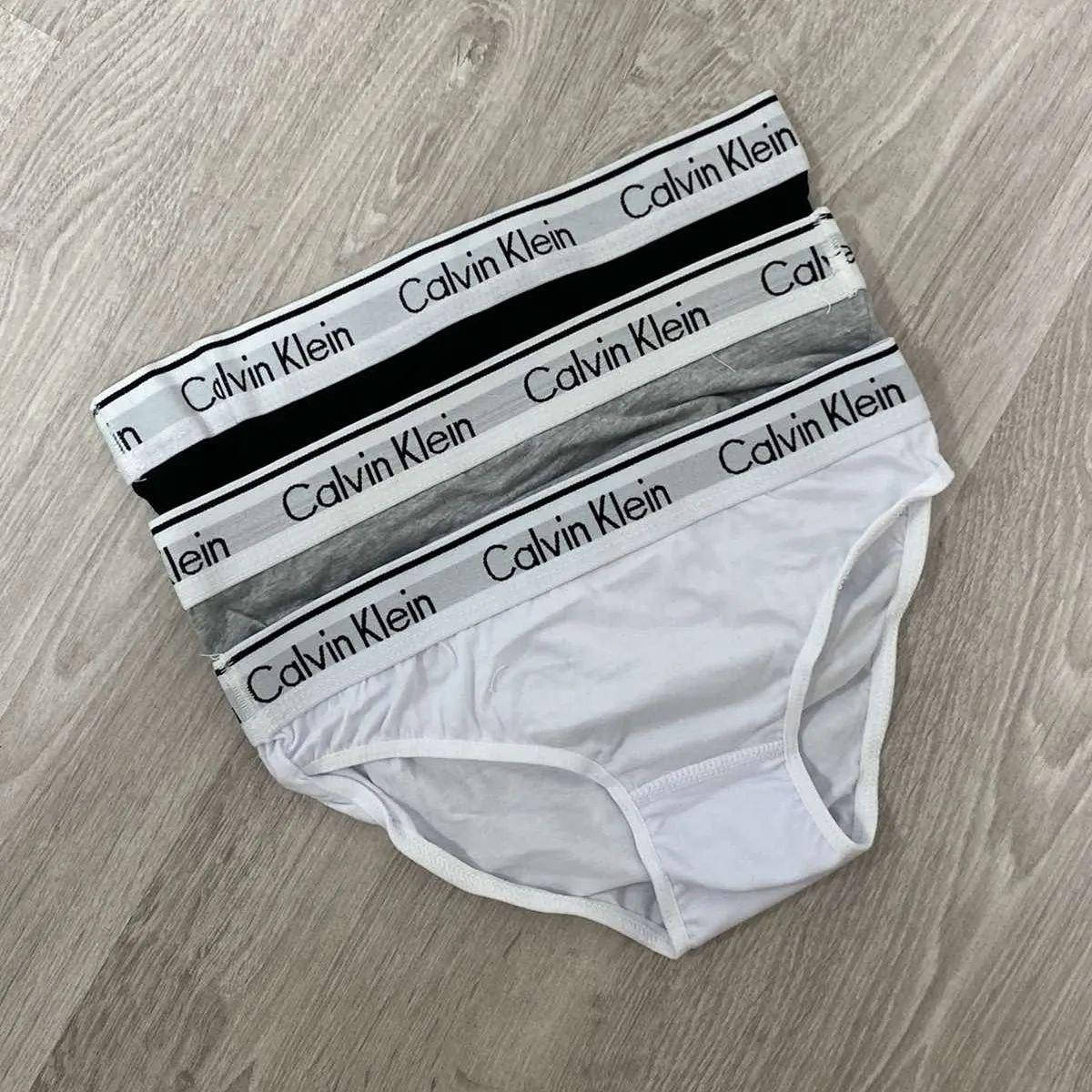 

Calvin Klein трусики (набор/поштучно) классика черные белые серые l