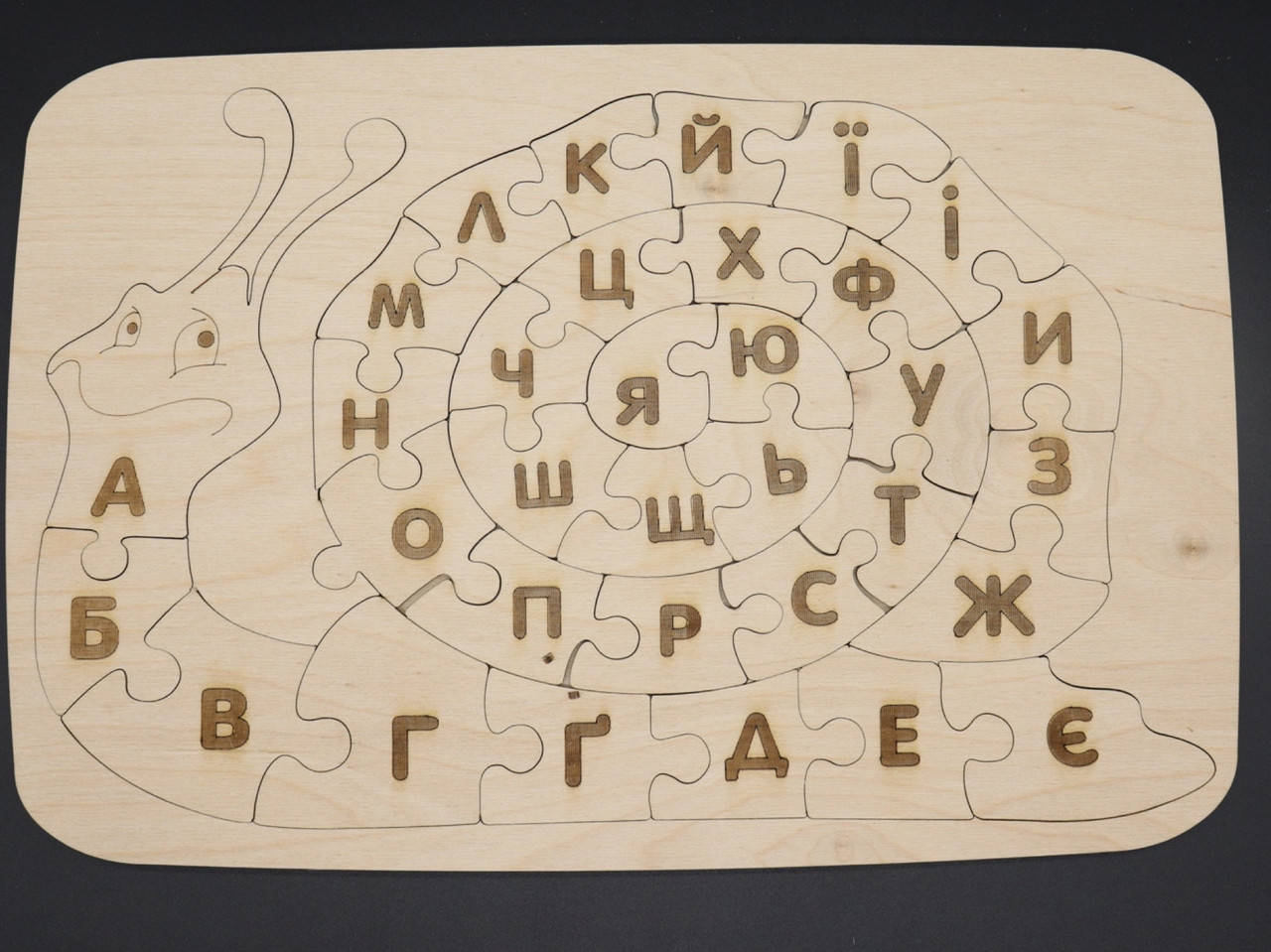 

Деревянный пазл. Украинский алфавит. Улитка.37*25