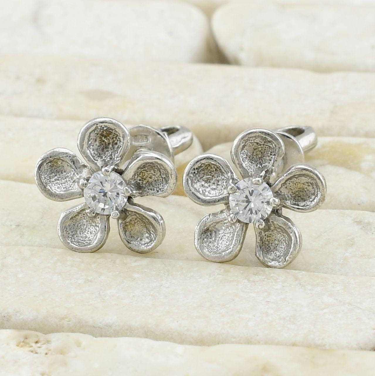 

Серебряные серьги гвоздики Семицветик размер 9х9 мм вставка белые фианиты вес 1.83 г