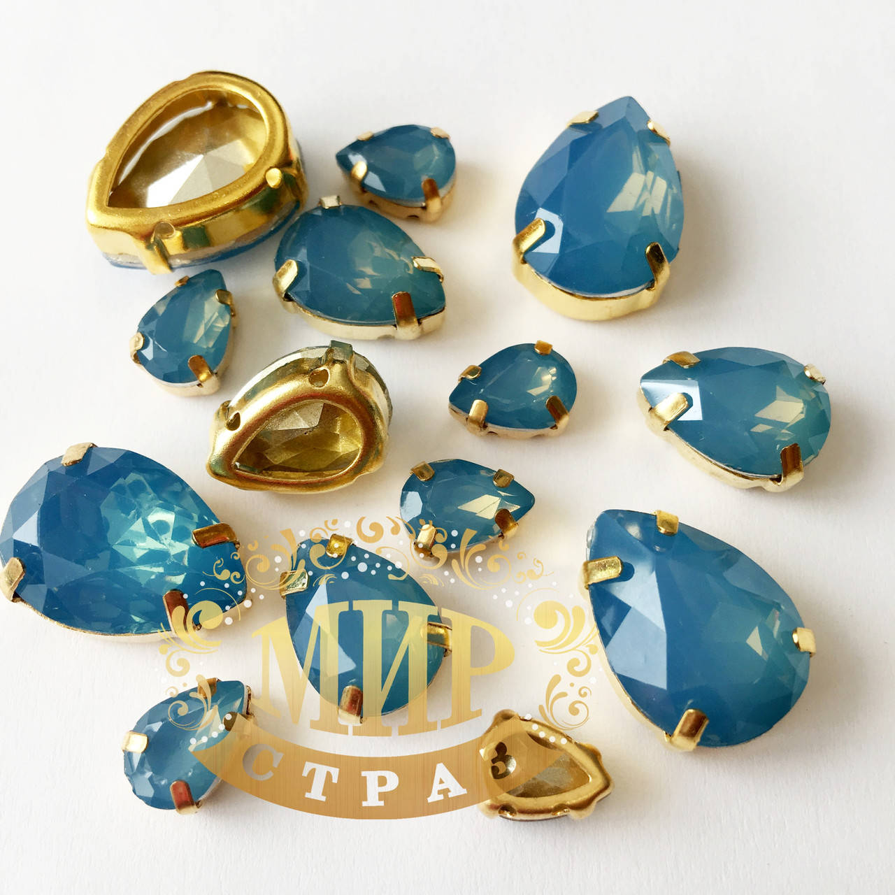 

Опаловые капли 7x10, в улучшенных золотых цапах, Цвет Blue Opal