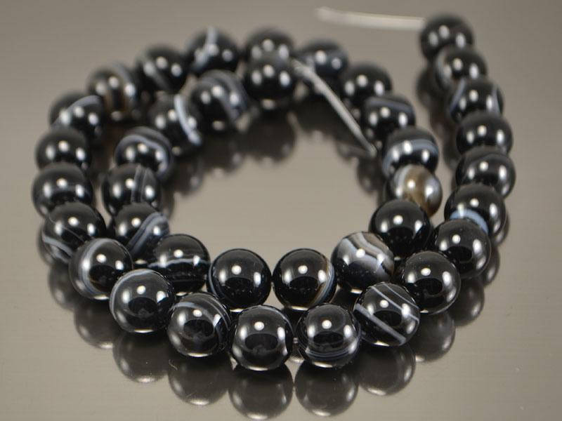 

Агат черный глазковый 10мм, круглый низка