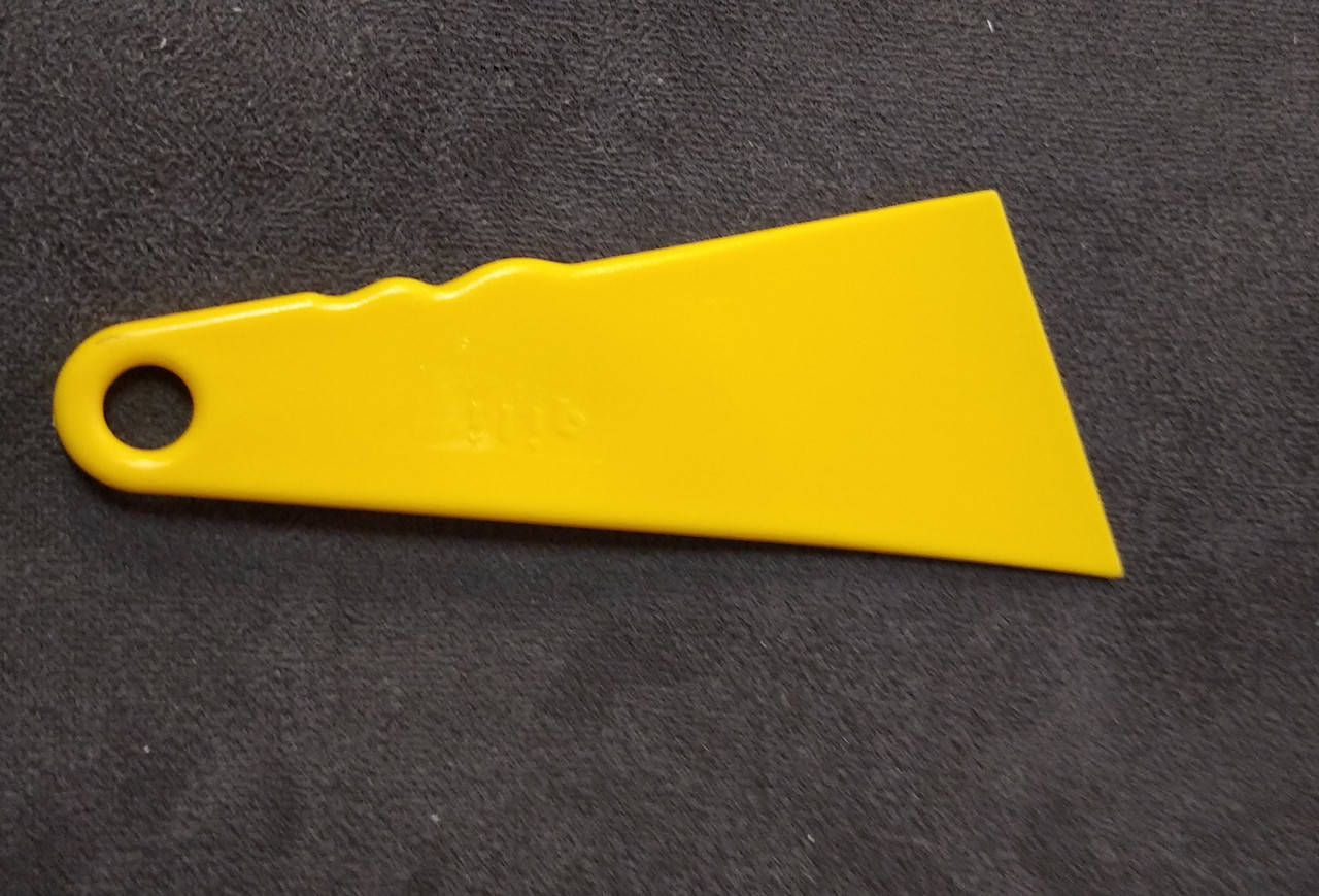 

Ракель треугольник пластиковый жесткий для поклейки и занятия старых плёнок