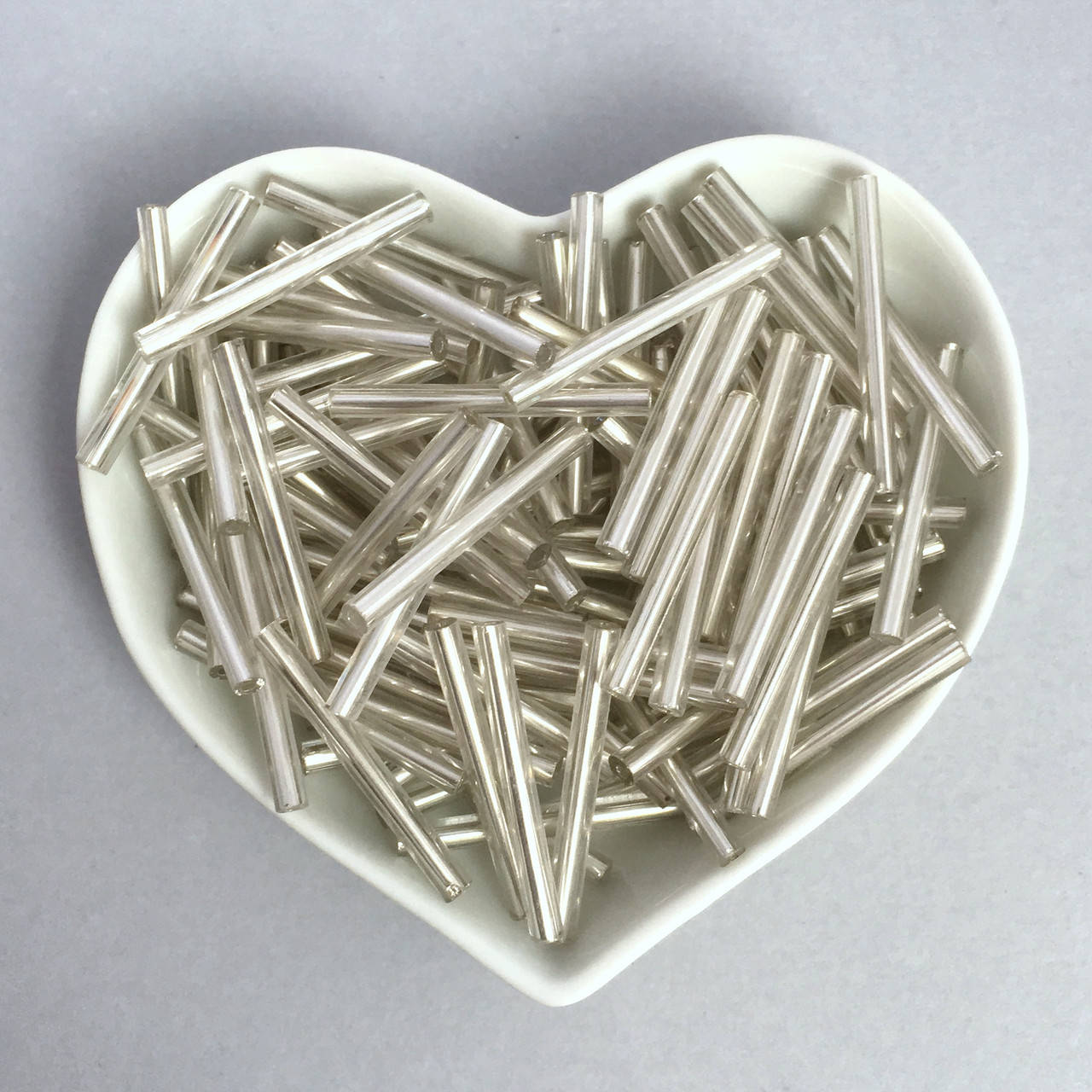 

Стеклярус длинный прямой 25 мм. Цвет: Серебристый