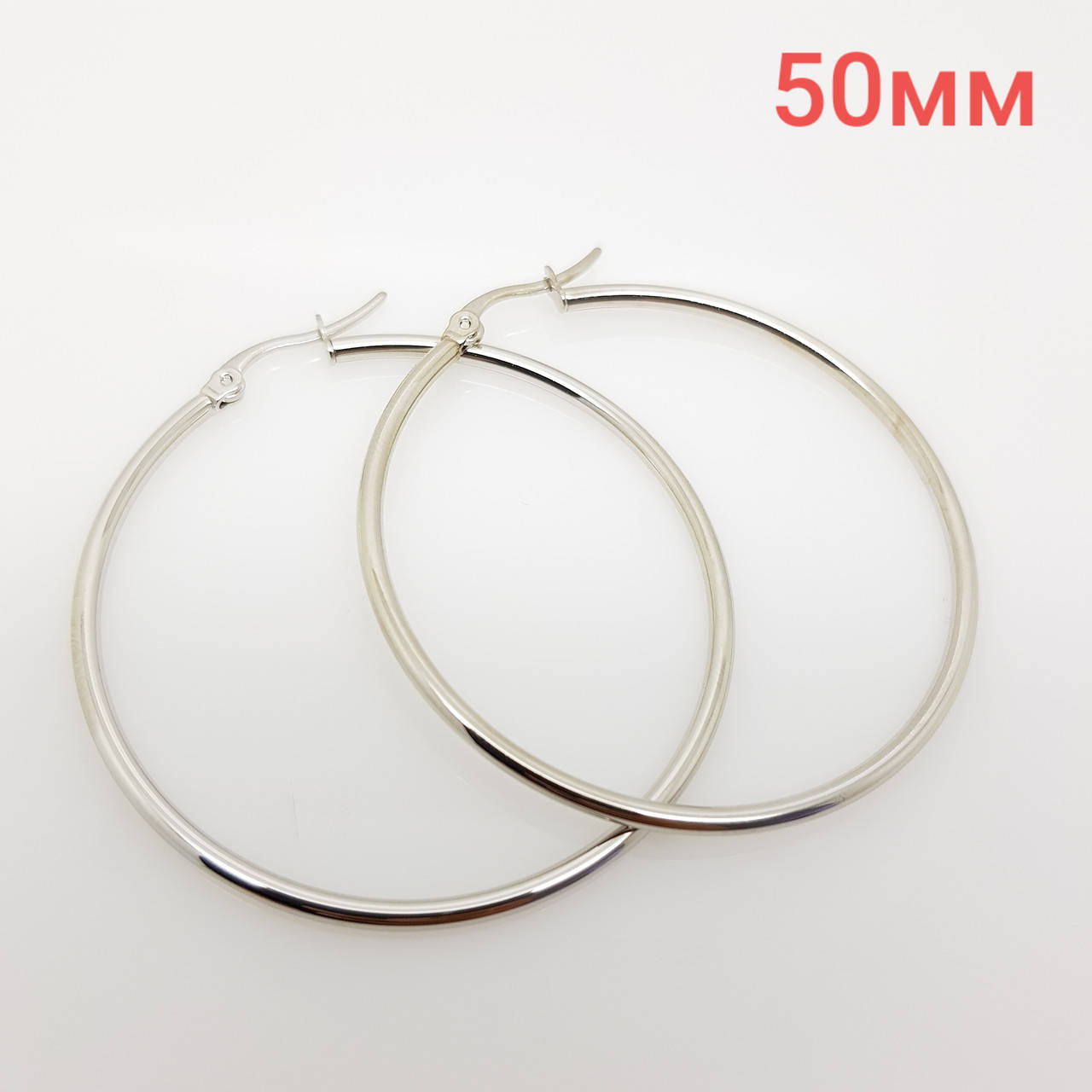 

Сережки-кольца, под серебро, 50 мм
