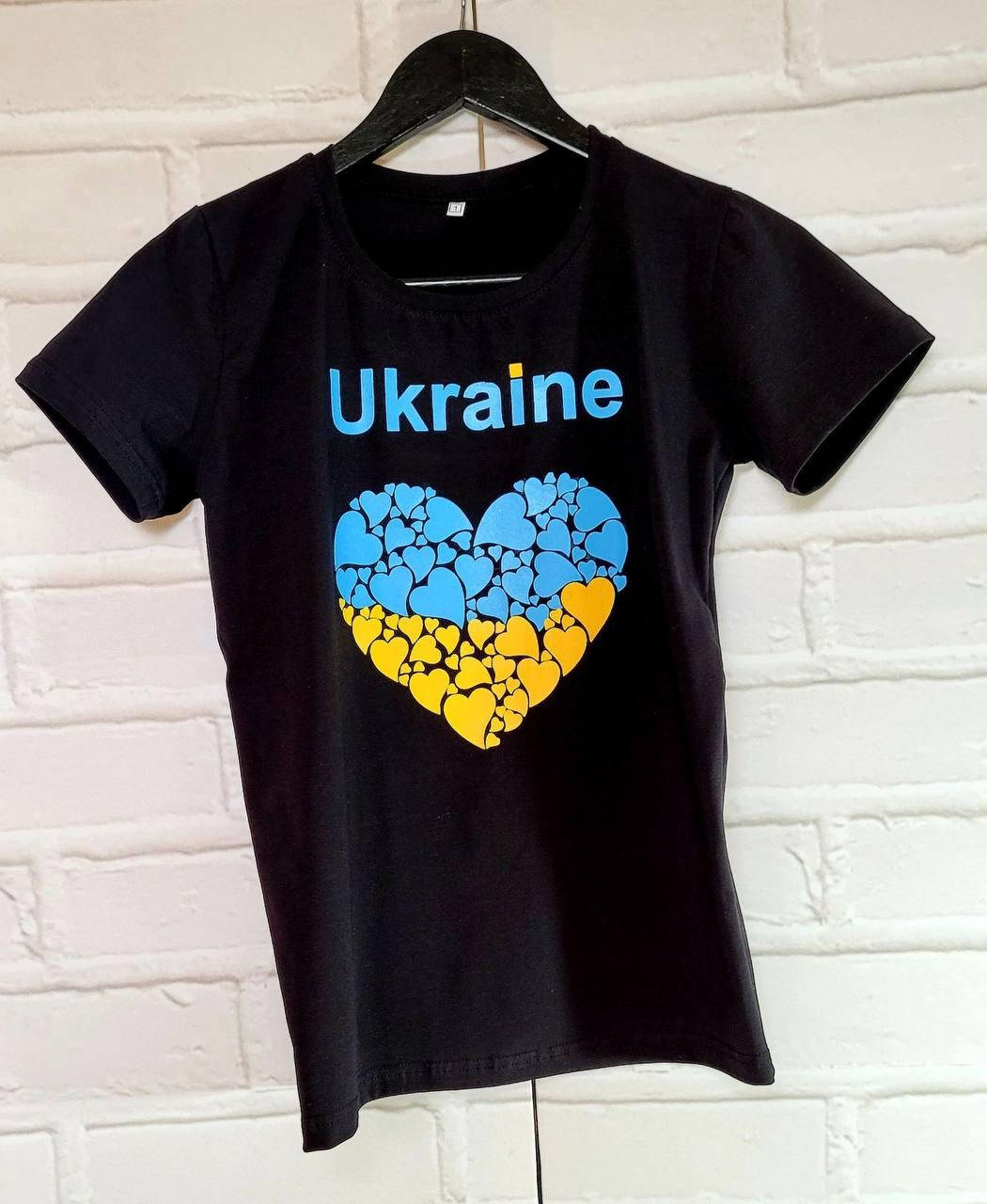 

Жіноча патріотична футболка Україна