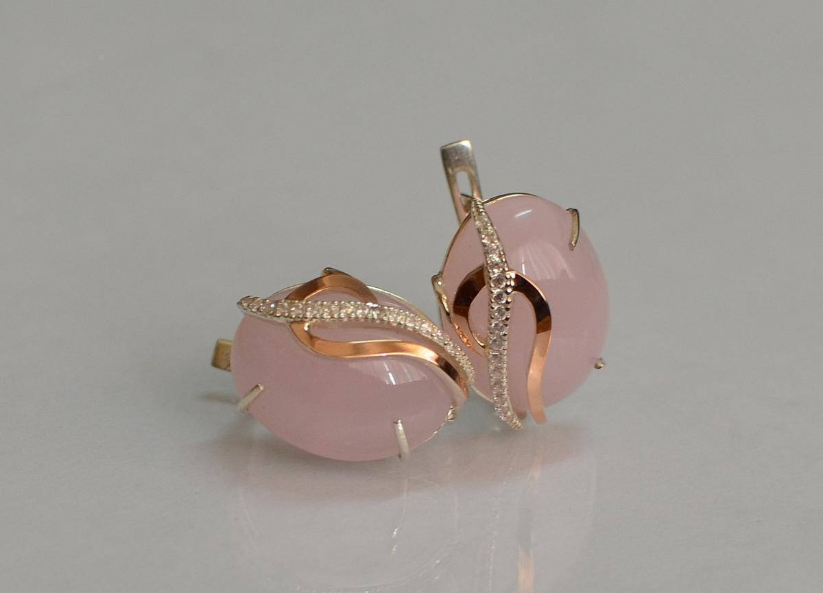 

Серебряные серьги с золотыми накладками 150с
