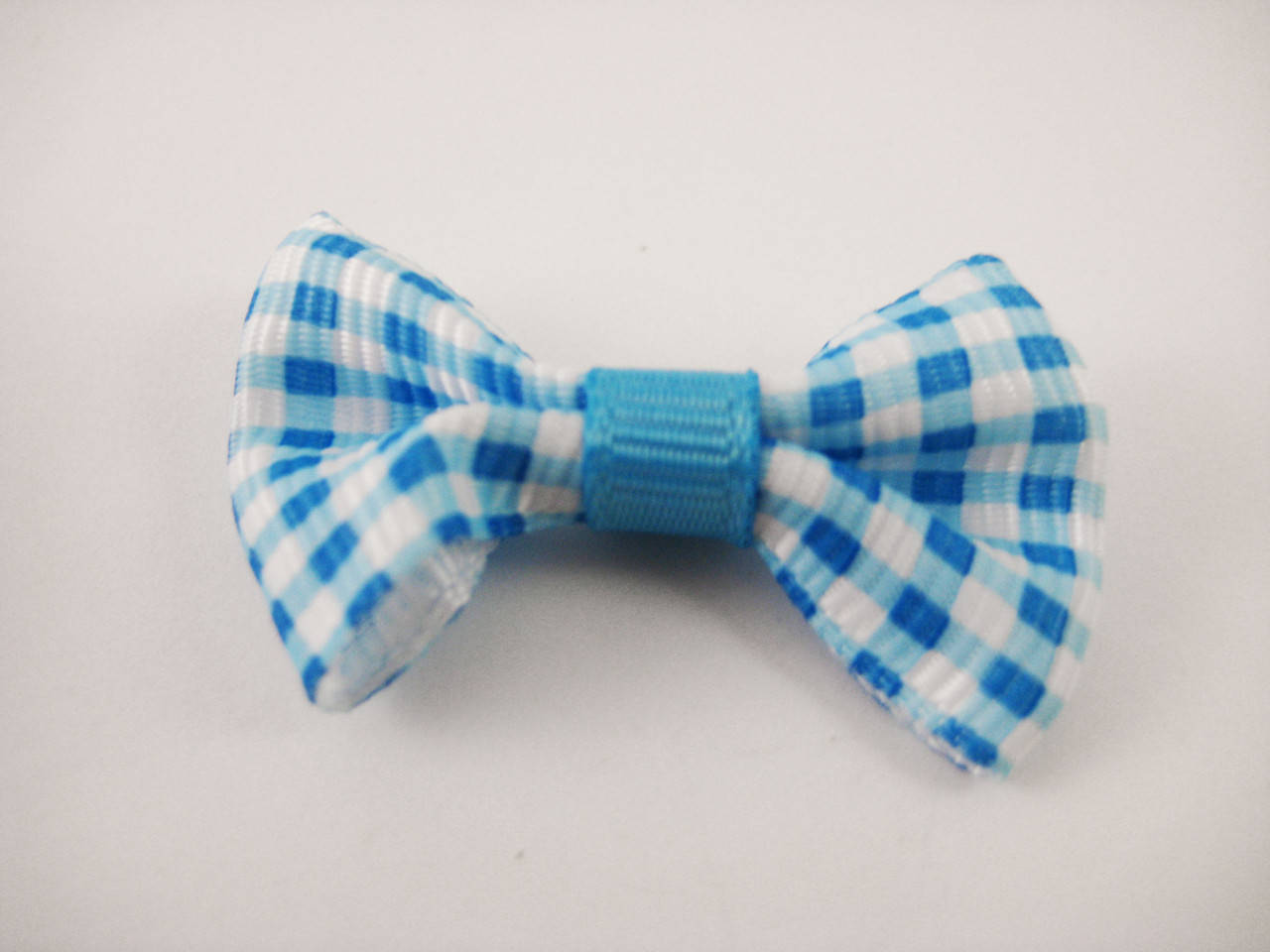 

Бантики. Цвет синий в клеточку. 4х2см
