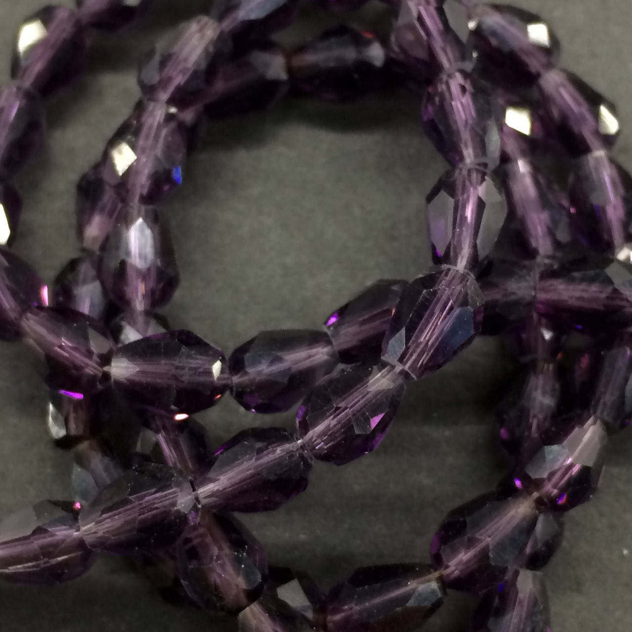 

Бусины на нитке Стекло овал 6*8мм цвет аметистовый (~72 бусины на нитке)