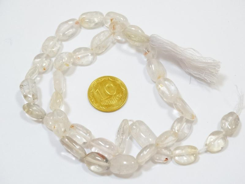 

Бусины на нитке натуральный камень Горный хрусталь овал L=31см