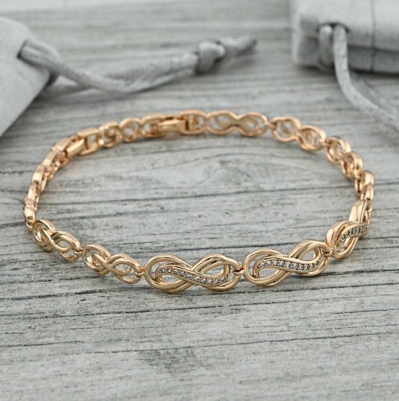 

Браслет 37021 ширина 7 мм белые фианиты позолота 18К длина 17+2