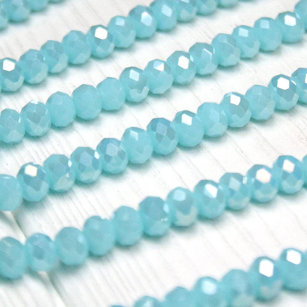 

Бусины хрустальные, граненные, 6 х 4 мм, 30 шт., стекло, цвет - небесно-голубой с АВ, непрозрачный