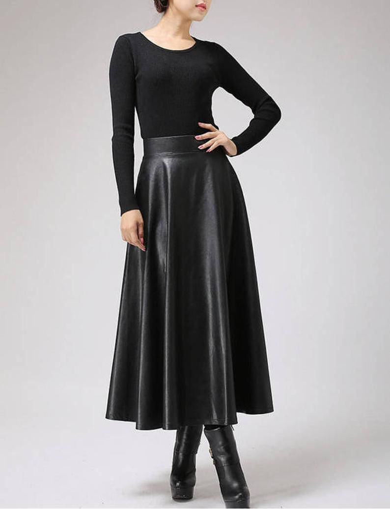 

Женская юбка солнце клеш миди из экокожи Nimfeya кожаная черная XXL, Черный