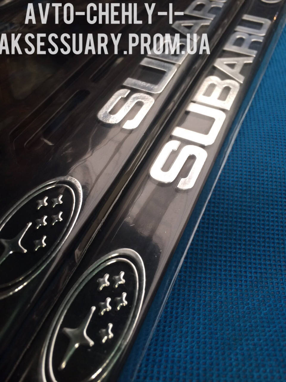 

Рамка номерного знака Subaru.