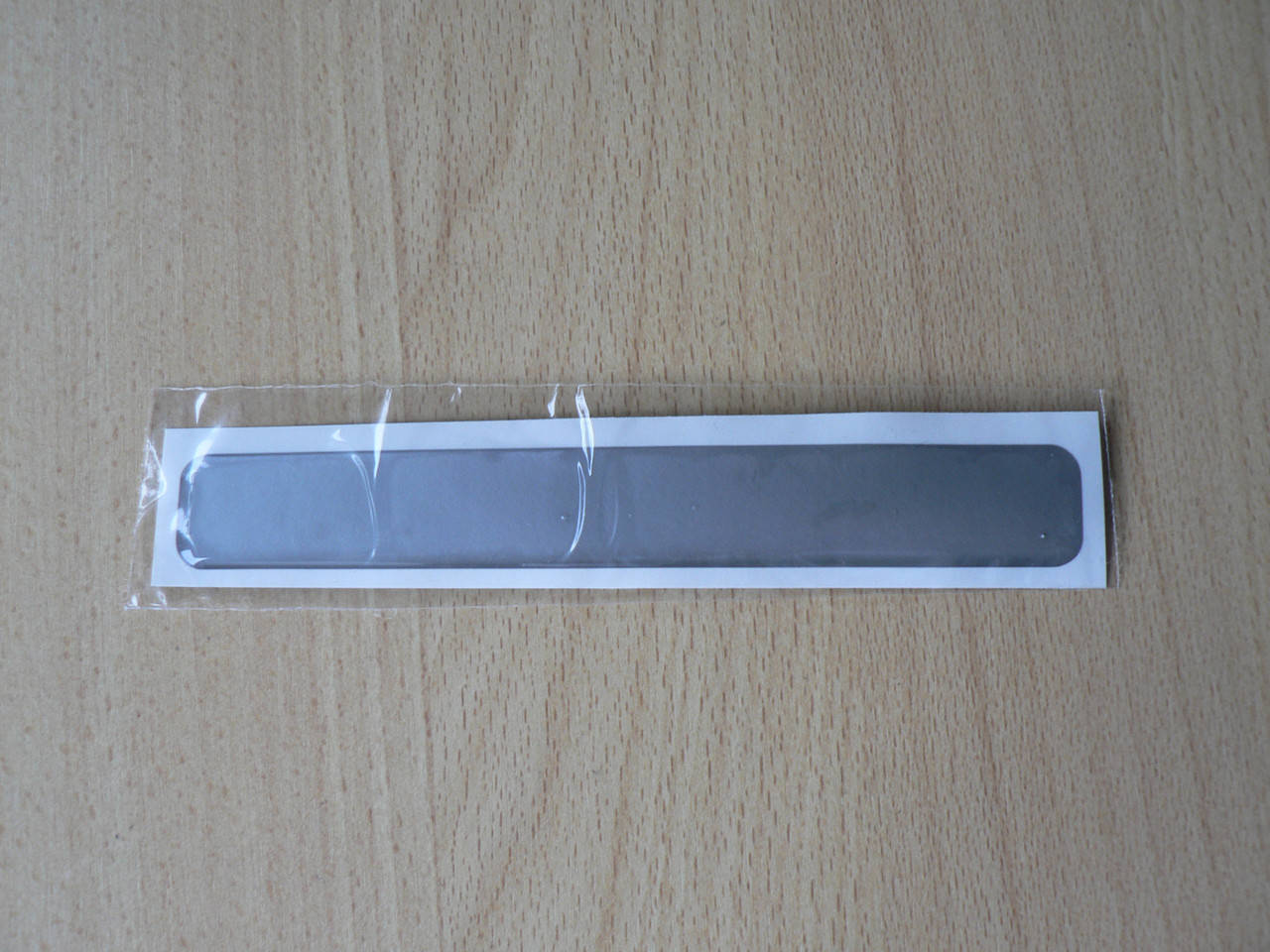 

Наклейка s силиконовая Полоса 149х20х1мм серая без надписи на авто, Серый