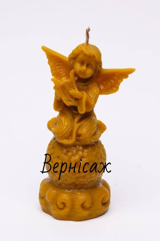 

Свічка воскова ангел на кулі