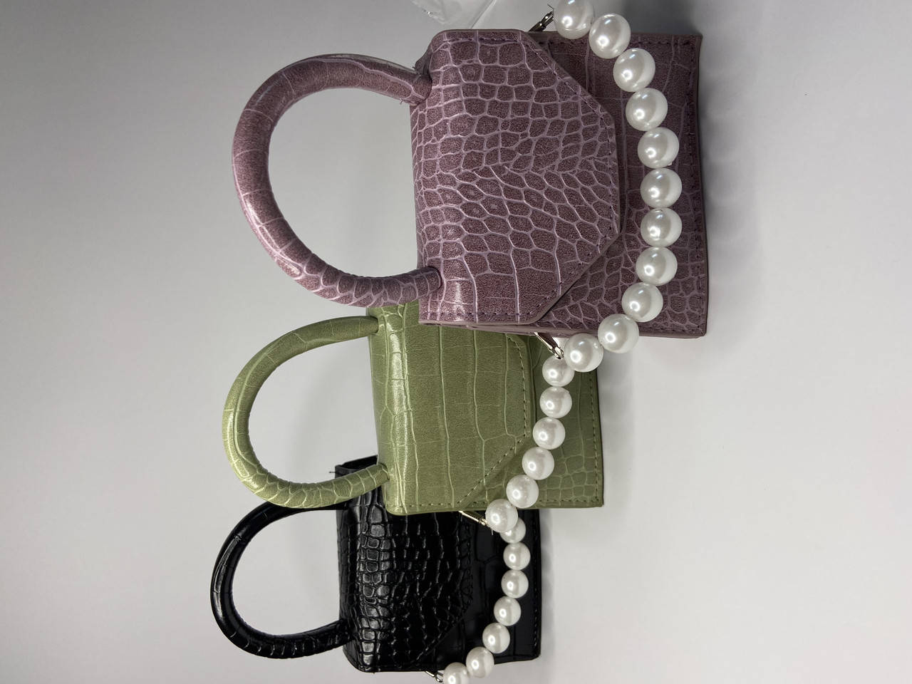 

Новая женская кожаная мини сумочка с жемчугом