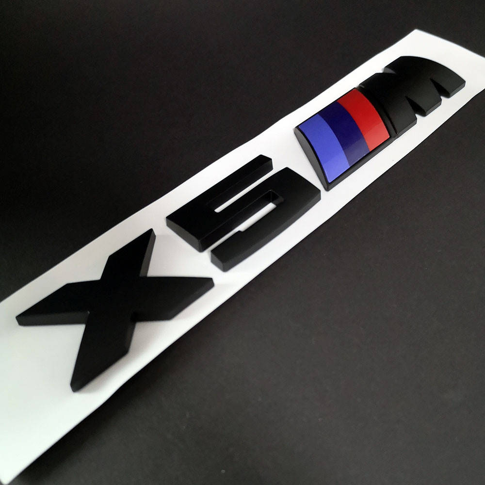 

Значок bmw х5 М на крышку багажника (черная)