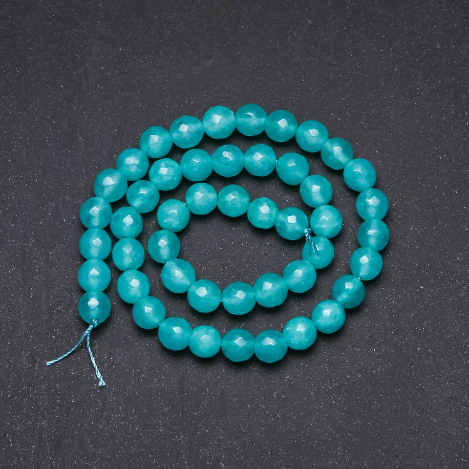 

Бусины Аквамарин им. граненный шарик d-8(+-)мм нитка L-38 см