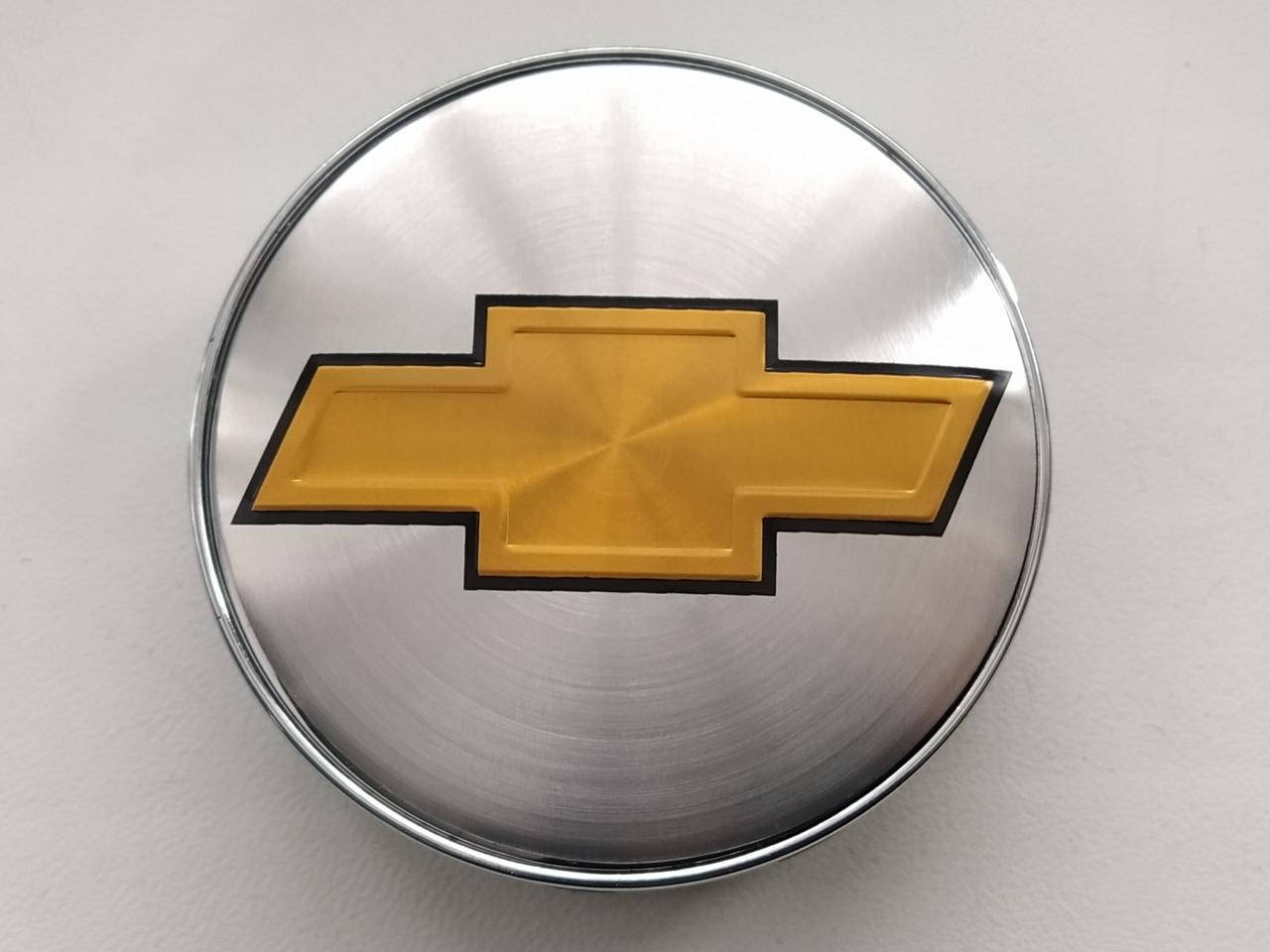

Колпачки заглушки в литые диски Chevrolet 60/56/10 мм. Серебро Хром.основа