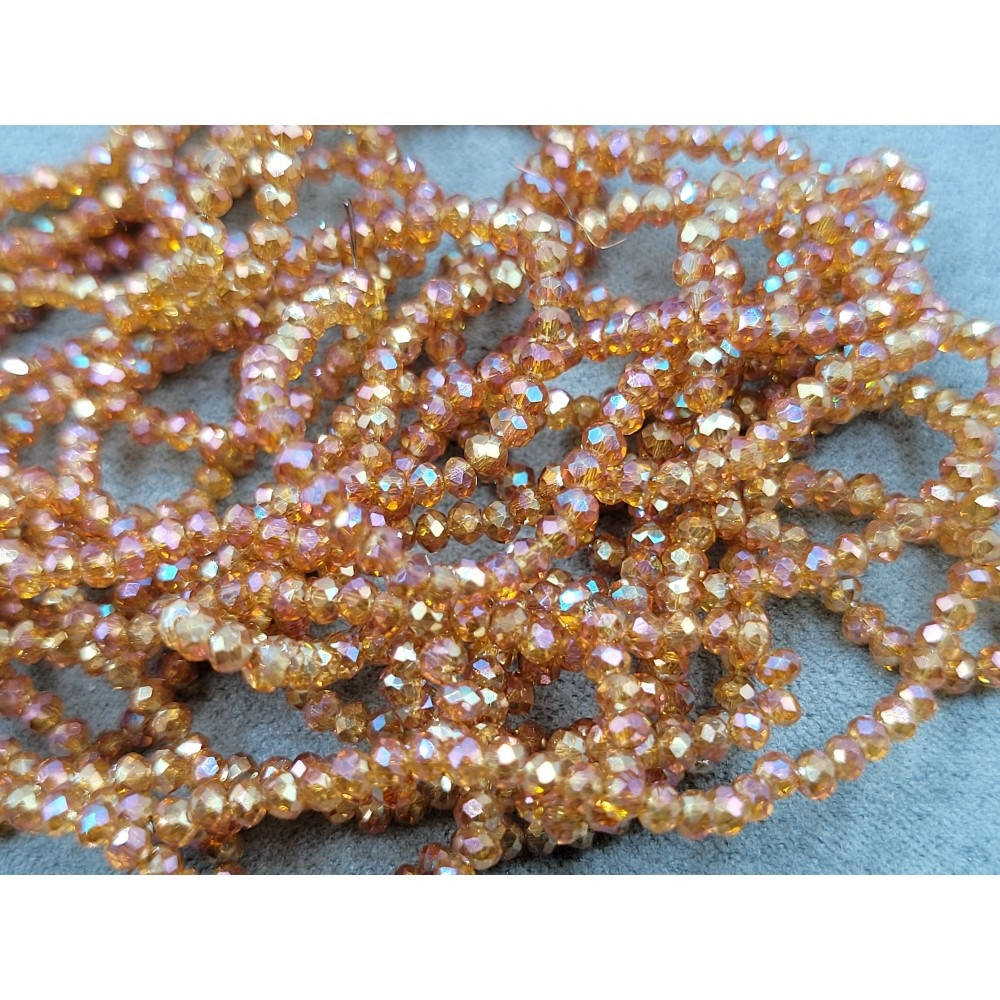 

Хрустальные бусины(рондель). Размер 2 мм. В упаковке прим.190 шт. цвет - темное шампанское