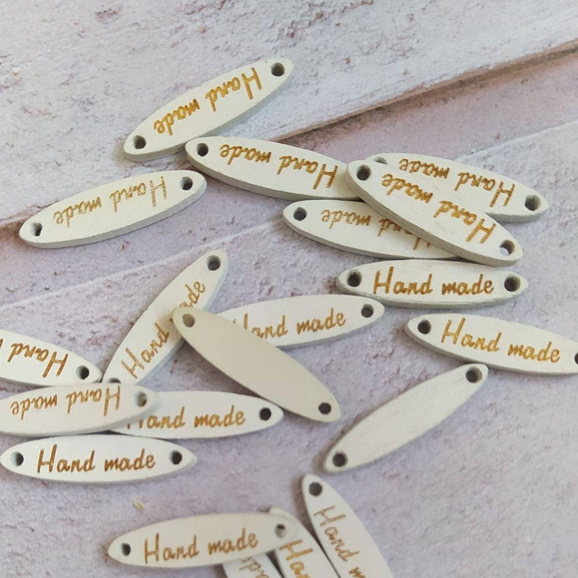 

Бірочка Хенд-мейд біла 27х7мм