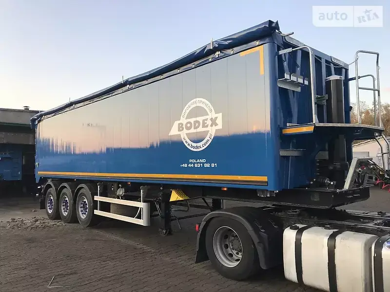 

ПВХ тент на зерновоз "Камаз" и прицеп из ткани ПВХ