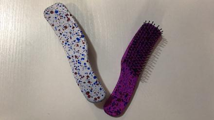 

Расческа изогнутая пятнистая