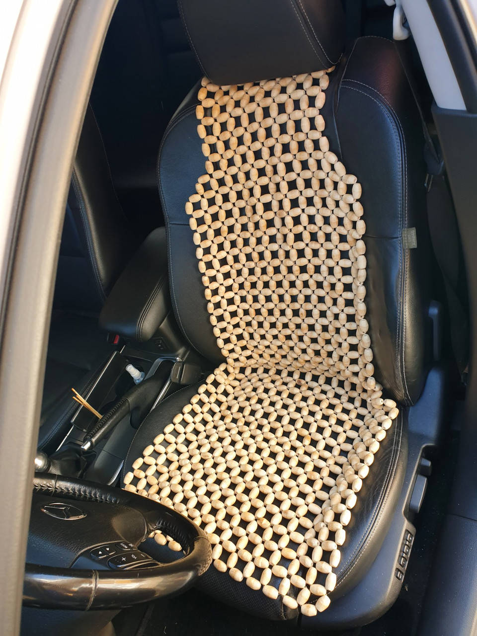 

Деревянный массажер в машину